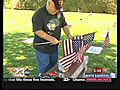 Vietnam Veteran Fixes Flags At Cemetery | BahVideo.com