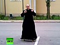 Skateboarding priest becomes sensation | BahVideo.com