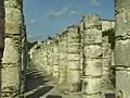 Royalty Free Stock Video SD Footage Zoom Out From Columns of Mayan Temple at Chichen Itza in Mexico | BahVideo.com