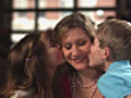 Siblings kiss their moms cheeks  | BahVideo.com