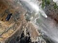 Daredevil flies through a waterfall wearing a  | BahVideo.com