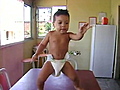 Diapered baby dances samba | BahVideo.com