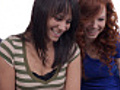 Teens using laptop together | BahVideo.com