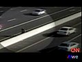Two Men Fight on a Highway | BahVideo.com