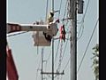 Crews Fix Snapped Power Poles | BahVideo.com
