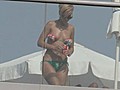 SNTV - Rihanna sizzles in tiny Bikini | BahVideo.com