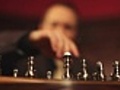 Hero plays chess the butler observes him | BahVideo.com