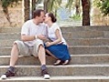 Couple kissing on the stairs | BahVideo.com