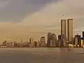 Royalty Free Stock Video SD Footage Static Shot to Historical New York Skyline and Twin Tower Buildings as Seagulls Fly By From a Ferry Filmed in 2001 | BahVideo.com