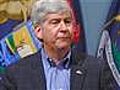 Michigan governor backs anti-labor law | BahVideo.com