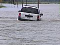 Reporter Saves Woman From Floods | BahVideo.com