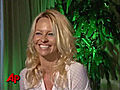 Pamela Anderson Gets Frisky for PETA | BahVideo.com
