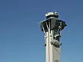 Royalty Free Stock Video HD Footage Zoom Into Control Tower at Los Angeles Airport in California | BahVideo.com