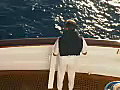 Stock Video Crew Member Standing at the Steering Console in the Port on the Caribbean Island of Dominica Royalty-Free SD Footage | BahVideo.com