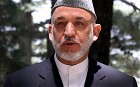 President Karzai buries slain brother in Kandahar | BahVideo.com