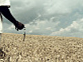 HD CRANE African Man Praying In Wheat | BahVideo.com