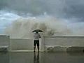 Man Admires the Big Waves | BahVideo.com