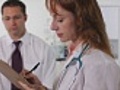Doctor Writing A Patient s Perscription | BahVideo.com