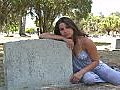 Beautiful Brunette In A Cemetery-10 Stock Footage | BahVideo.com