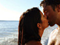 Attractive couple kiss in the water | BahVideo.com