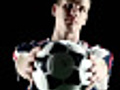 Soccer player holds ball out | BahVideo.com
