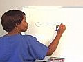 Beautiful Nurse Writes C-Section On A White  | BahVideo.com