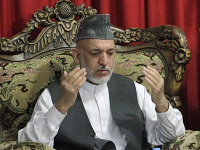Afghan president buries slain half brother | BahVideo.com