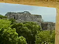 Royalty Free Stock Video SD Footage Zoom Out from Inside a Mayan Temple Observatory at Chichen Itza in Mexico | BahVideo.com