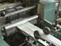 paper bags folded in industrial folding machine | BahVideo.com