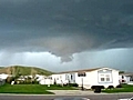 Large Tornado Forms Behind Trailer Park | BahVideo.com