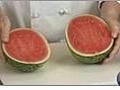 Cutting Watermelon Halves | BahVideo.com