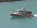 Royalty Free Stock Video HD Footage US Coast Guard Patrol Boat in the Harbor at Honolulu Hawaii | BahVideo.com