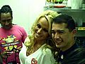Pamela Anderson with employees at millions of  | BahVideo.com