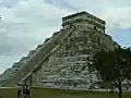 Royalty Free Stock Video SD Footage Zoom Into Top of Mayan Temple at Chichen Itza in Mexico | BahVideo.com