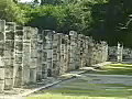 Royalty Free Stock Video SD Footage Zoom Out From Columns of Mayan Temple at Chichen Itza in Mexico | BahVideo.com