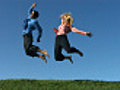 Man and woman jumping with excitement slow motion | BahVideo.com