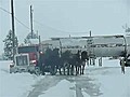 Horses Pull Truck Out of Snow | BahVideo.com