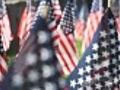 American Flags Blow in Breeze Track Right ECU | BahVideo.com