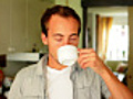 Young Man Drinking Coffee - At Home | BahVideo.com