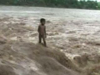 Dramatic Rescue After Boy Stranded by Flash Flooding | BahVideo.com