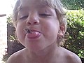 Boy Holds A Cicada In Mouth | BahVideo.com