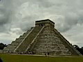 Royalty Free Stock Video SD Footage Zoom Out from Mayan Temple at Chichen Itza in Mexico | BahVideo.com