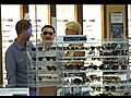 Paris Hilton Shops For Sunglasses With A Mystery Man | BahVideo.com