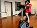 Asian female training spining bike in gym | BahVideo.com