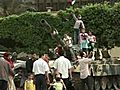 Gadhafi Tanks Turn Playground For Kids | BahVideo.com