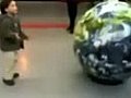 Little Kid Gets Owned by Giant Globe | BahVideo.com