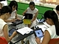 Singapore school trades books for iPads | BahVideo.com