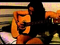 jenny tuning a guitar | BahVideo.com