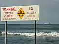 Royalty Free Stock Video HD Footage Strong Surf Sign at Waikiki Beach in Honolulu Hawaii | BahVideo.com