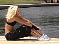 Beautiful Blonde Athlete Relaxes Outdoors  | BahVideo.com